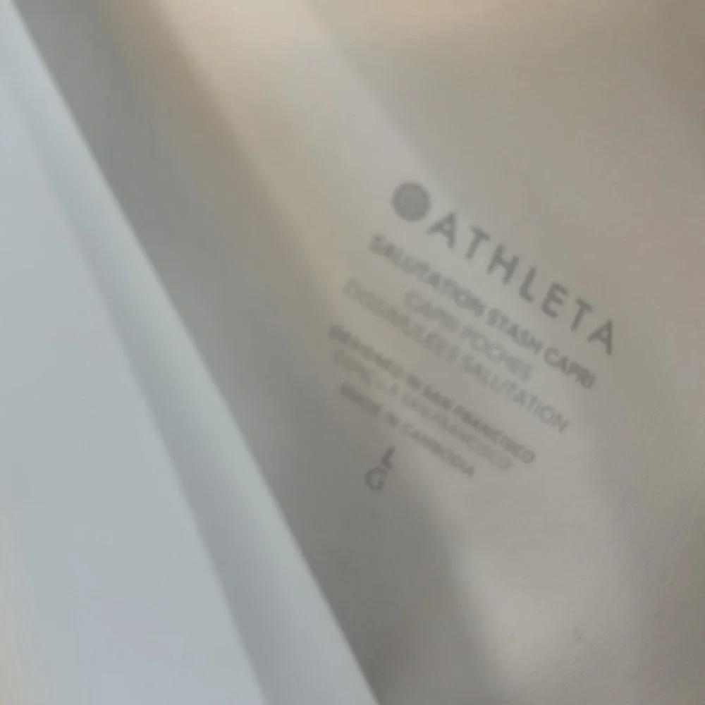 Athleta Capri leggings  cream color good for workouts and casual wear